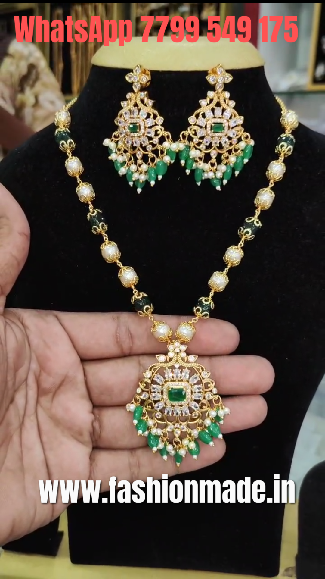 A 20-inch gold-toned necklace with a central emerald-cut green stone, surrounded by smaller clear stones and delicate green pearl drops, Matching earrings with similar design and dangling pearls are also shown.
