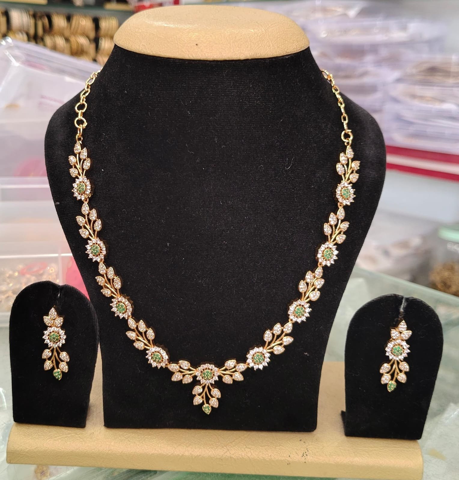 Long necklace with earring rings featuring green and white CZ stones, 22k gold plated, stylish design suitable for all occasions