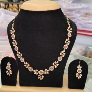 Long necklace with earring rings featuring red and white CZ stones, 22k gold plated, stylish design suitable for all occasions